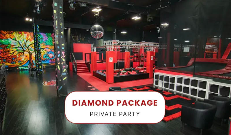 An indoor party venue with red and black decor, obstacle courses, trampolines, and colorful wall art. A sign in the foreground reads “Diamond Package Private Party.”.